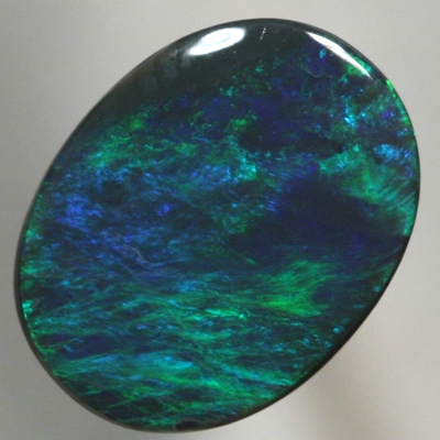 SOLID BLACK OPAL Strong, rich fire in a Scotch Plaid pattern. SEE VIDEO